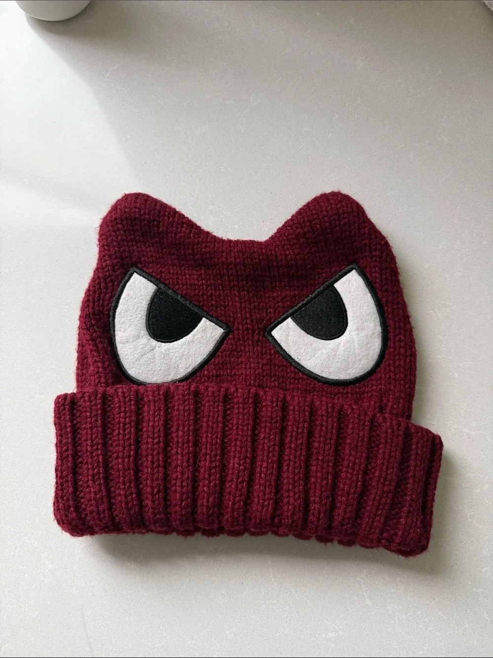Burgundy Knit Beanie with Playful Eyes